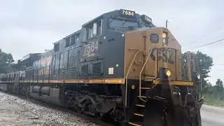 Csx #7584 leading and Csx #1834 trailing for light power to pick up cars in Gainesville ga on 7/2/25