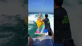 Tiktoker wears high heels while surfing