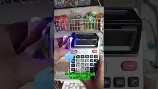 Calculator with money detector
