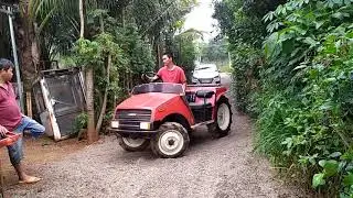 Báo giá bán xe máy cày hai ghế ngồi tay lái gật gù số điện thoại trong phần mô tả video.