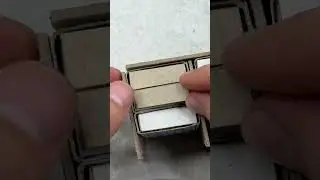 Miniature matchstick and cardboard chest of drawers.🗄️
