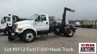 Lot 9112 2006 Ford F-650 Hook Lift Truck 123,636 4x2; Dual Rear Wheels Caterpillar 7.2L Diesel Auto