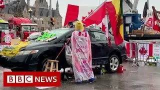 Police arrest leaders of trucker convoy in Canadian capital - BBC News