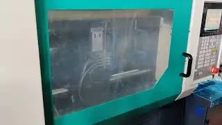 Plastic cap injection molding machine