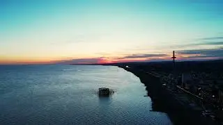 Palace Pier to West Pier dron fly sunset