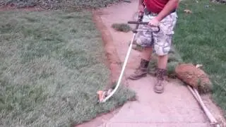 Stick edger cutting sod