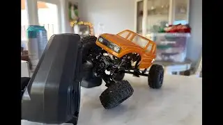 Modified SCX24 and a woodpile!