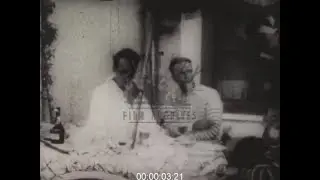 F. Scott Fitzgerald sat at table, 1920s - Film 1090894