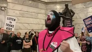 Trans protesters storm capitol with demon shaman