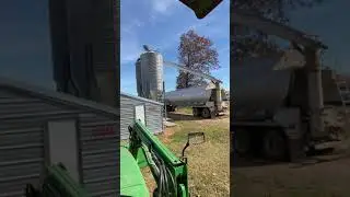 Putting up chicken feeds on our feed bins