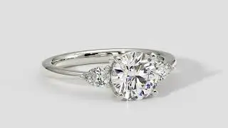 Round Brilliant Cut Diamond Ring With Pear Shape Side Diamonds In White Gold &ndash; ADN