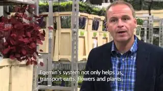 In-floor chain conveyor system for flower transport at Flora Holland Aalsmeer auction by Dematic