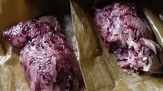 Sticky rice wrapped in banana leaves