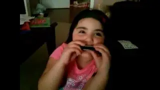 Lena on Harmonica