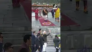 Prime Minister Narendra Modi greets people in Bhutan&rsquo;s Thimphu