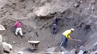 Using Iron Spears We Dug Sand From The Right And Left Side Of The Cliff