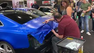Folienking | Folierung einer Heckklappe auf der Essener Motorshow