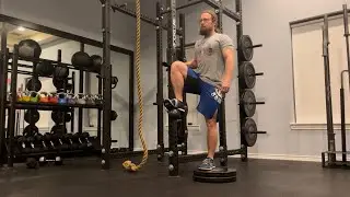 Standing Hip Flexion (March) with Kettlebell Exercise Demonstration