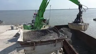 Clamshell Bucket In Action - Seamless Material Handling Equipment