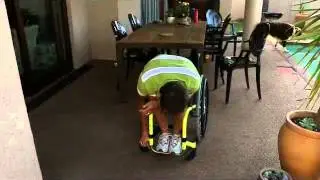 C6 quadriplegic getting up from knees on wheelchair