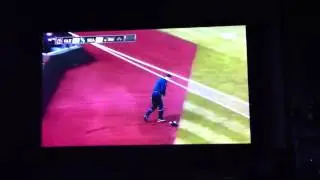 Mariners ball girl drives for ground ball, misses