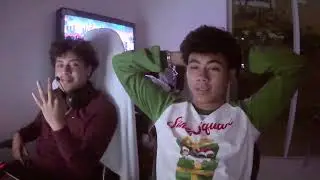 The boys playing fort taking blinkers