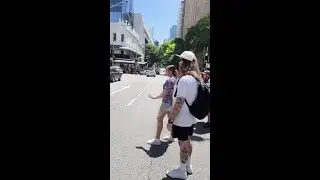 Two Aussie flag bearers at Invasion Day 2026 rally