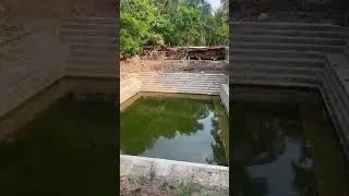 10.5 feet deep now ( 9.5 feet stone + .5 feet Nelli padi ( wood ) + .5 feet Concrete base )
