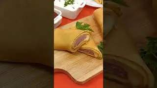 Pancakes stuffed with ham and cheese