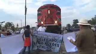 MUST SEE! Mexican Train Runs Over Protest!