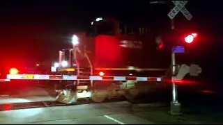 Canadian National Train Flying Through Plainfield, IL at night