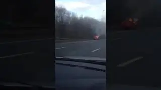 Car on fire on the m6 outside Preston