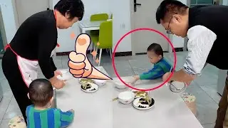 Dad's glued to his phone, even the baby can't stand it!