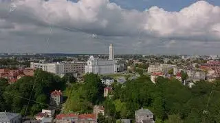 Aerial views showcase the cityscape of Kaunas, Lithuania, highlighting the iconic Christ's