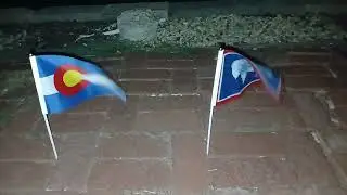 Flags of Colorado and Wyoming waving
