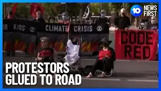 Extinction Rebellion Protestors Glue Themselves To Road