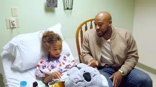 AJ Dillon shares copies of his new book to Bellin Hospital patients
