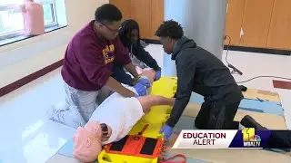 Dunbar High School students take up life-saving skills in class