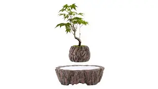 Magnetic levitation floating flower pot with natural rock and lake design