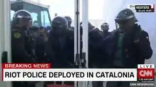 Riot police Break into Polling Station, clashing with Catalan independence voters in Spain