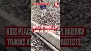 Children Placing Stones on Railway Tracks During Bengal Protest