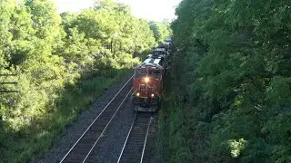 A CN train with a DPU seen at the Denfield Rd bridge.  2959, 8818, 3406, 7502 & DPU 8326 as power.