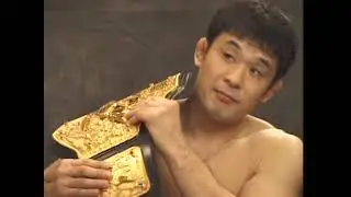 Mark Kerr rolls with  Kazushi Sakuraba