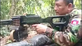 Cambodian soldier fires machine gun during border clashes with Thai troops