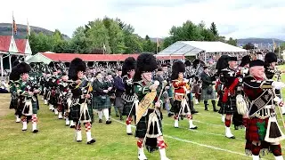 Drum Majors lead the massed pipes and drums Games march during 2025 Braemar Gathering in Scotland