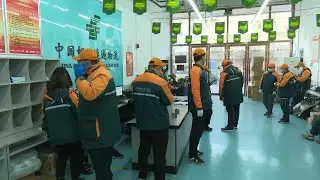 Couriers return to work in virus-hit Shijiazhuang