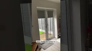 Grey Blackout Electric Roller Blinds Fitted On Double Patio doors