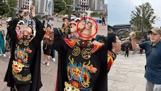 Chinese lad street performers eating fire and spitting fire#Chongqing #chinesetheatre