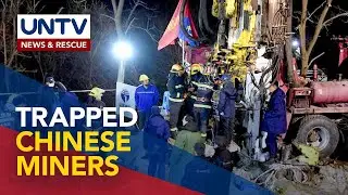 Rescuers in phone contact with trapped Chinese gold miners