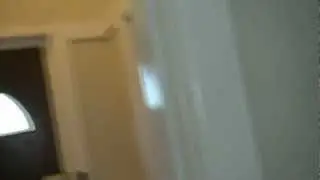 Painting door frames with a brush, using Dulux Aquanamel